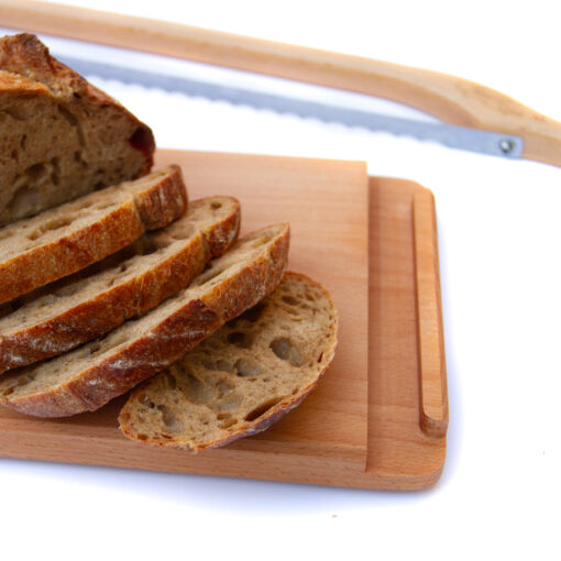 Beech JonoKnife Compact breadboard with sliced bread & JonoKnife