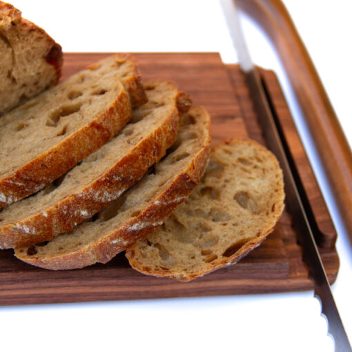 Walnut JonoKnife Compact breadboard with sliced bread & knife